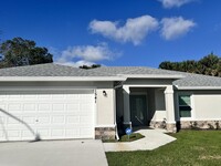 1541 SW Urbino Ave in Port St. Lucie, FL - Building Photo - Building Photo