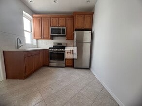 Fully Renovated 1-Bedroom Apartment in the in Queens, NY - Building Photo - Building Photo