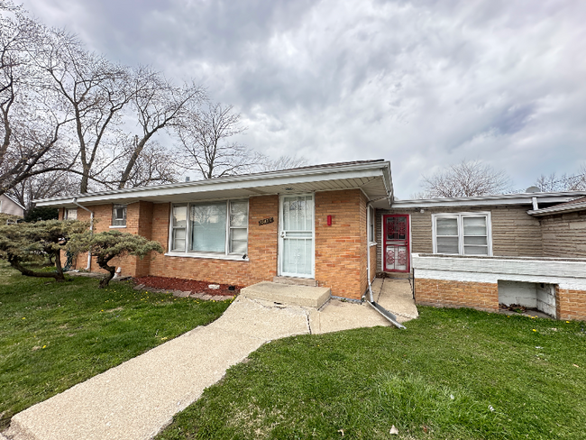 property at 13835 S Tracy Ave
