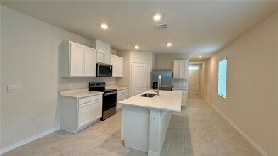 3314 Pine Lily Ave in Poinciana, FL - Building Photo - Building Photo