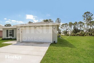 2114 SW Biella Ave in Port St. Lucie, FL - Building Photo - Building Photo