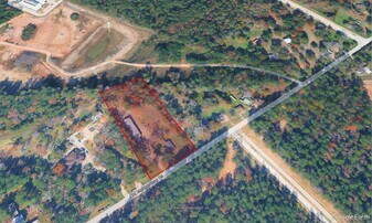 12021 Old Montgomery Rd in Willis, TX - Building Photo
