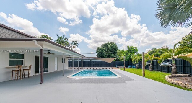 property at 7560 NW 15th St