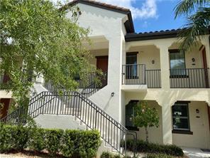 15114 Palmer Lake Cir-Unit -202 in Naples, FL - Building Photo
