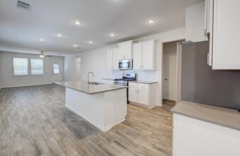 196 Pepperbark Loop in Mustang Ridge, TX - Building Photo - Building Photo