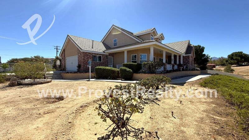 10281 Whitehaven St in Oak Hills, CA - Building Photo