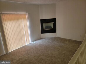 977 Joshua Tree Ct, Unit 105 in Owings Mills, MD - Building Photo - Building Photo