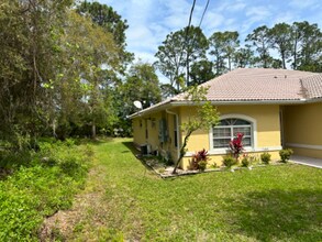 160 Fenimore Ln in Palm Coast, FL - Foto de edificio - Building Photo