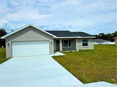 7 Malauka Pass Dr in Ocklawaha, FL - Building Photo