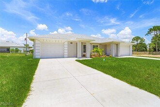 903 Albany Ave in Lehigh Acres, FL - Building Photo - Building Photo