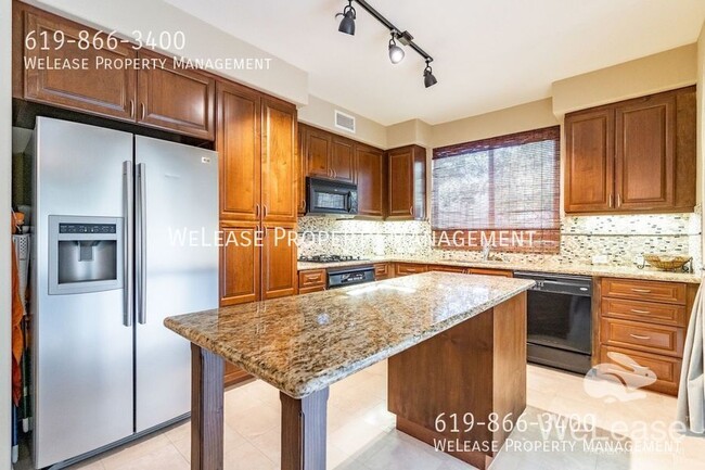 8211 Station Village Ln in San Diego, CA - Building Photo - Building Photo