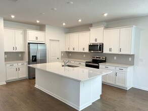 2598 Chickasaw Plum Loop in Clermont, FL - Building Photo - Building Photo