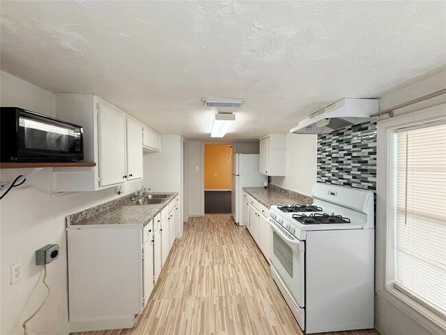 property at 723-727 W 27th St
