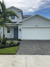 5924 NW Fairfax Ave in Port St. Lucie, FL - Building Photo - Building Photo