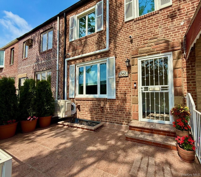 property at 63-65-6376 76th St