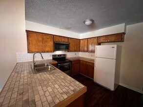 Rustic 2 Bedroom Condo in Convenient Location in Auburn, AL - Building Photo - Building Photo
