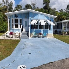 10823 Ani Cir in Estero, FL - Building Photo - Building Photo