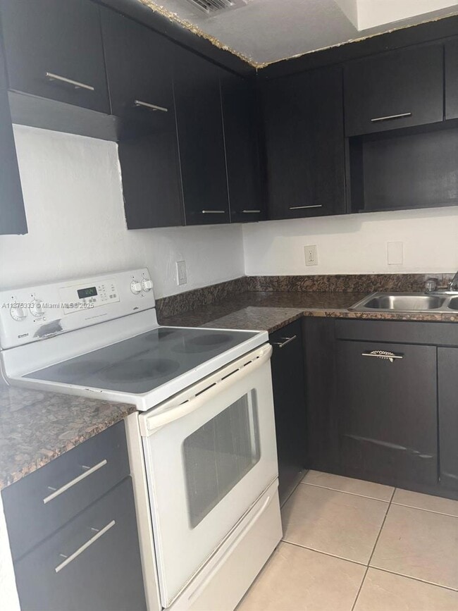property at 13700 NE 6th Ave