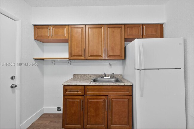 property at 7155 W 14th Ct