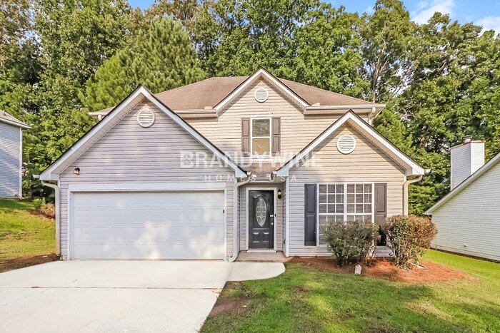 3918 Tolliver Hills Dr in Ellenwood, GA - Building Photo