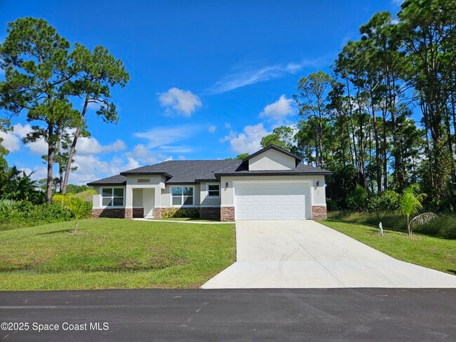 561 Harrisburg St SW in Palm Bay, FL - Building Photo - Building Photo
