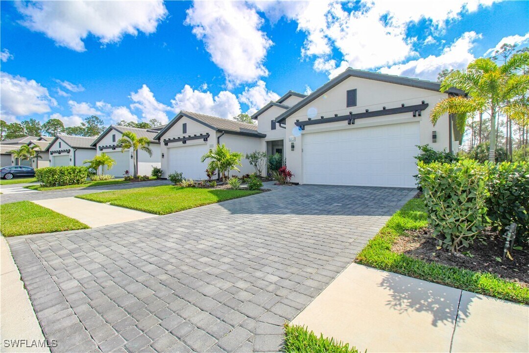 14620 Kingfisher Lp in Naples, FL - Building Photo