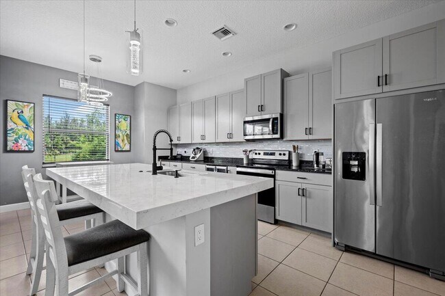 15406 Goldfinch Cir in Westlake, FL - Building Photo - Building Photo