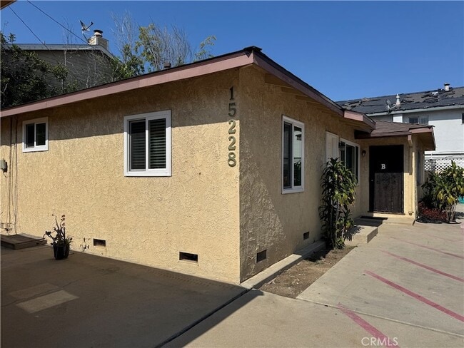 property at 15228 Normandie Ave
