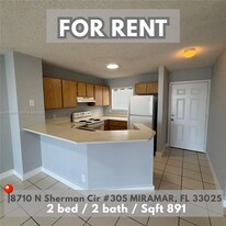 8710 N Sherman Cir, Unit 305 in Miramar, FL - Building Photo