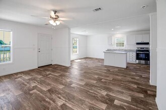 1447 Whispering Pnes Lp in Frostproof, FL - Building Photo - Building Photo