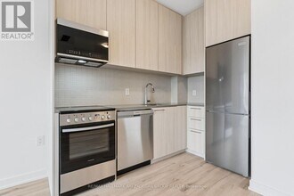 7437 Kingston Rd in Toronto, ON - Building Photo - Building Photo