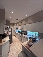 10728 Blue Bimini Cir, Unit 07-404G in Estero, FL - Building Photo - Building Photo