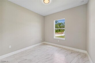 1040 Milwaukee Blvd in Lehigh Acres, FL - Building Photo - Building Photo