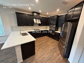 1430 Lone Feather Trail in Aloma, FL - Building Photo - Building Photo