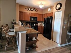 20301 Estero Gardens Cir-Unit -201 in Estero, FL - Building Photo - Building Photo