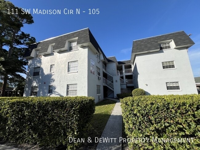 property at 111 SW Madison Cir N