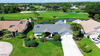 14557 Eagle Ridge Dr in Ft. Myers, FL - Building Photo