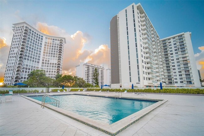 property at 5601 Collins Ave