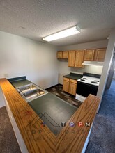 410 13th Ave NW, Unit Unit 21 in Oelwein, IA - Building Photo - Building Photo