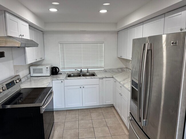 property at 310 W Blue Heron Blvd