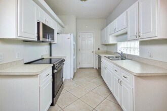 10735 Maui Cir in Estero, FL - Building Photo - Building Photo