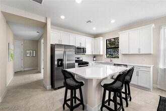 12041 Canal Grande Dr in Miromar Lakes, FL - Building Photo - Building Photo