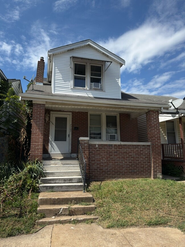 property at 7707 Vermont Ave