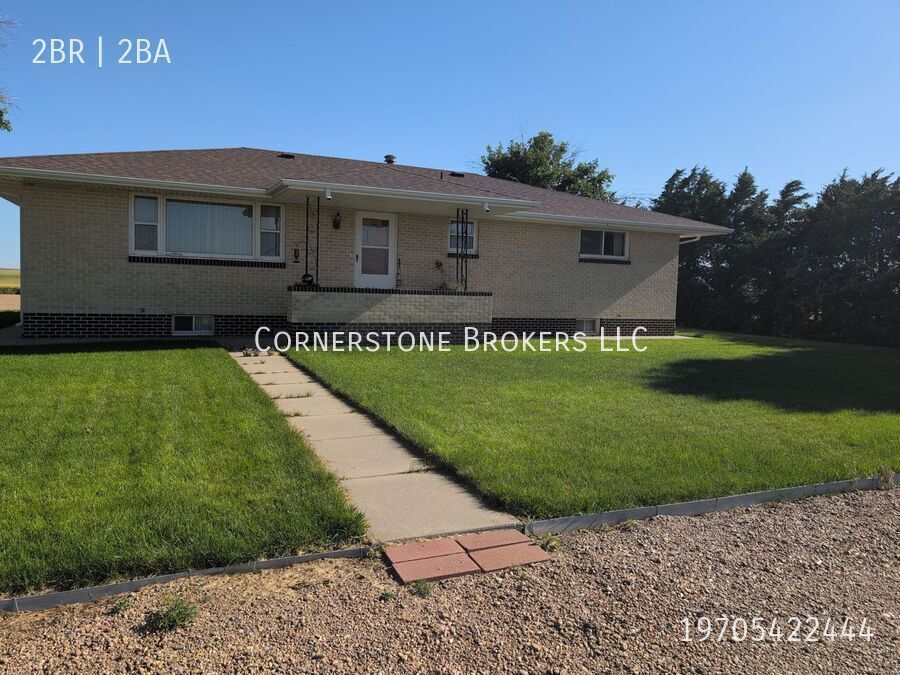 2238 County Rd O in Wiggins, CO - Building Photo