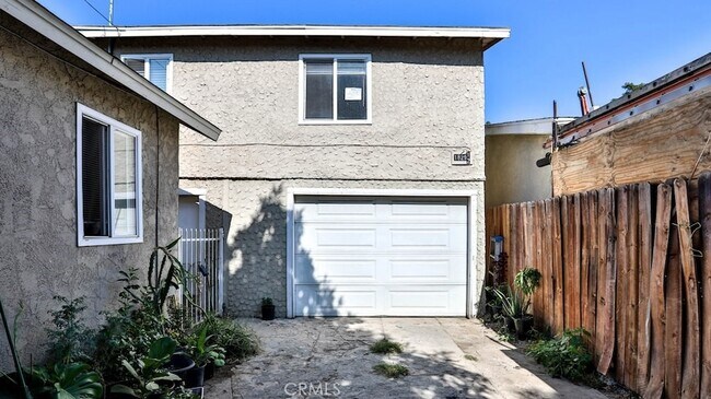 1829 1/2 E 63rd Street Unit in Los Angeles, CA - Foto de edificio - Building Photo