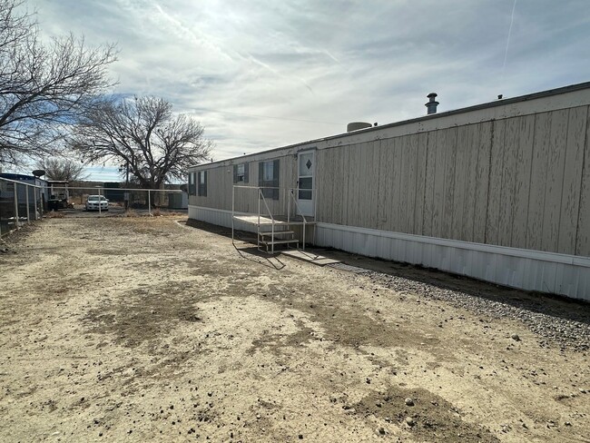 207 W Pinon Ave in Bloomfield, NM - Building Photo - Building Photo