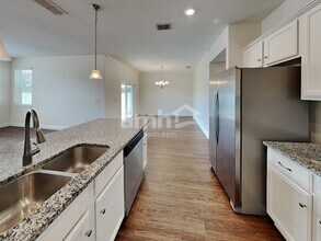 7801 Stumble Journey Ln in Progress Village, FL - Foto de edificio - Building Photo