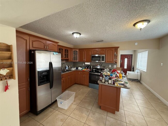 property at 6720 SW 21st St