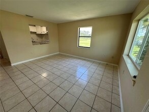 77 Boundary Blvd, Unit D in Rotonda West, FL - Building Photo - Building Photo