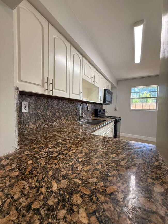 property at 516 NW 179th St